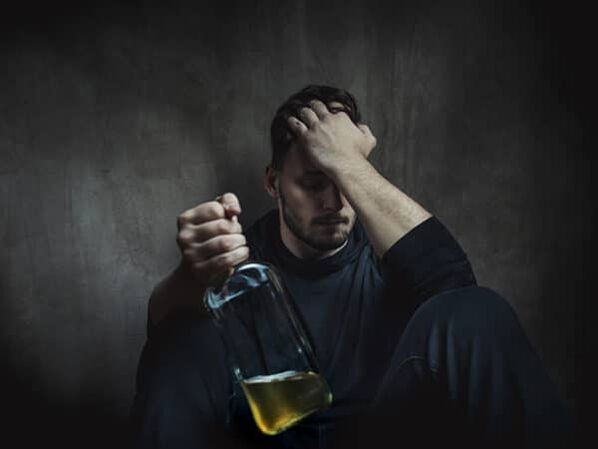 man drinking how to help stop drinking